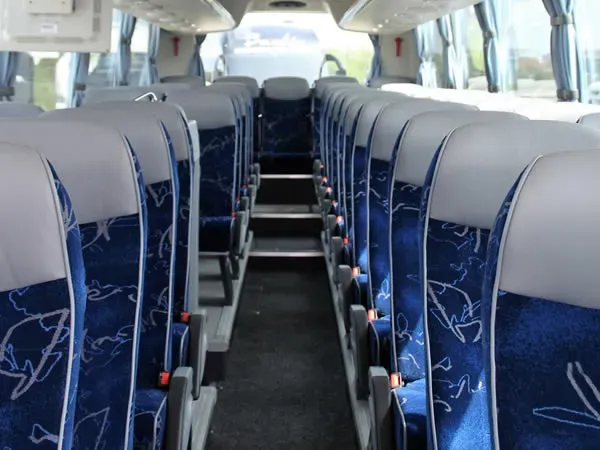 Coach on a road used for rail replacement
