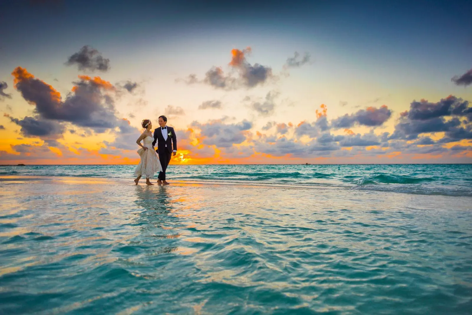 Couple holding hands after their ceremony